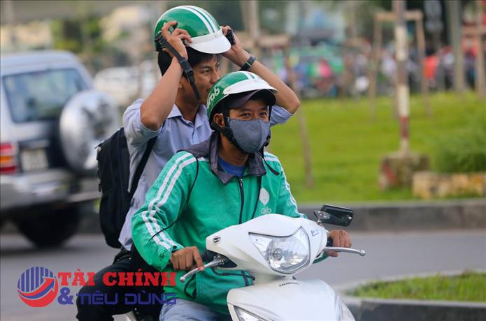 Grab lại thu thêm phụ phí thời tiết nắng nóng