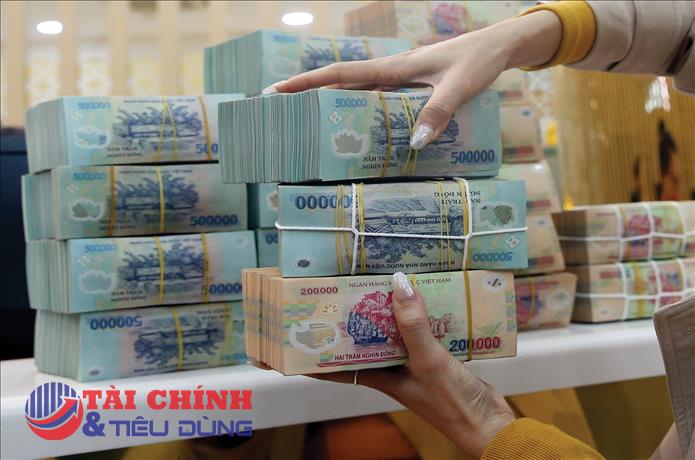 Ngành ngân hàng kiểm soát nợ xấu, áp lực vẫn lớn